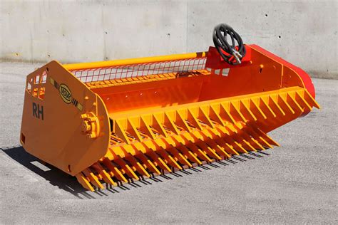 rock pickers for skid steer|used pull behind rock picker.